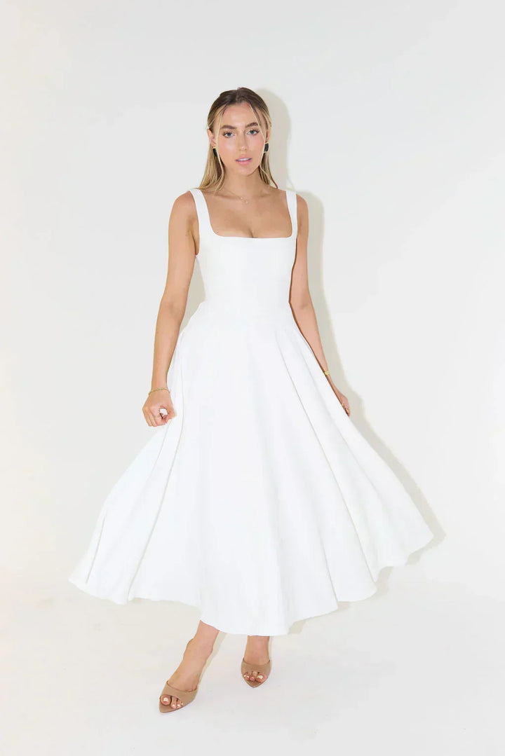 Flattering fit of the elegant square neck midi dress for women, offering comfort and sophisticated style.