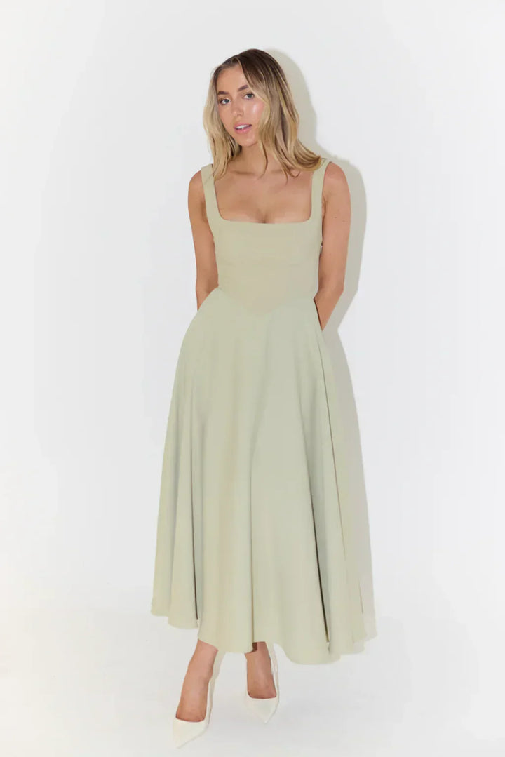 Sleeveless square neck midi dress for women, ideal for elegant summer fashion and warm weather occasions.
