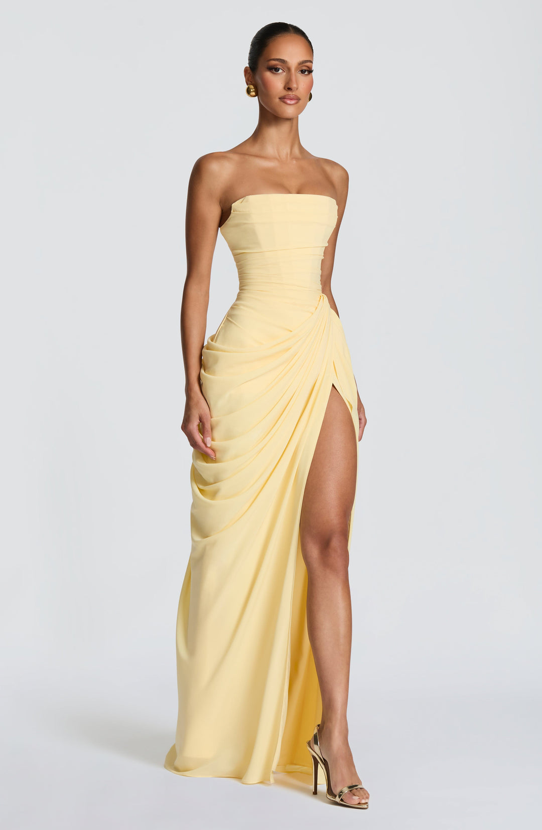 Chic women's strapless maxi dress with draped corset bodice. Ideal for parties, evening wear, and formal events.