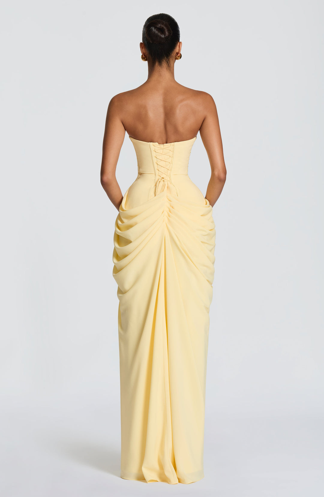 Fashionable women's strapless maxi dress with a flattering corset bodice. Perfect elegant party & formal wear.