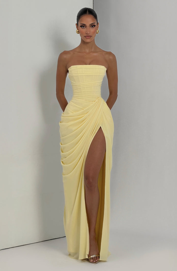 Luxurious women's strapless evening wear: corset maxi dress with high slit & sophisticated lace-up back.
