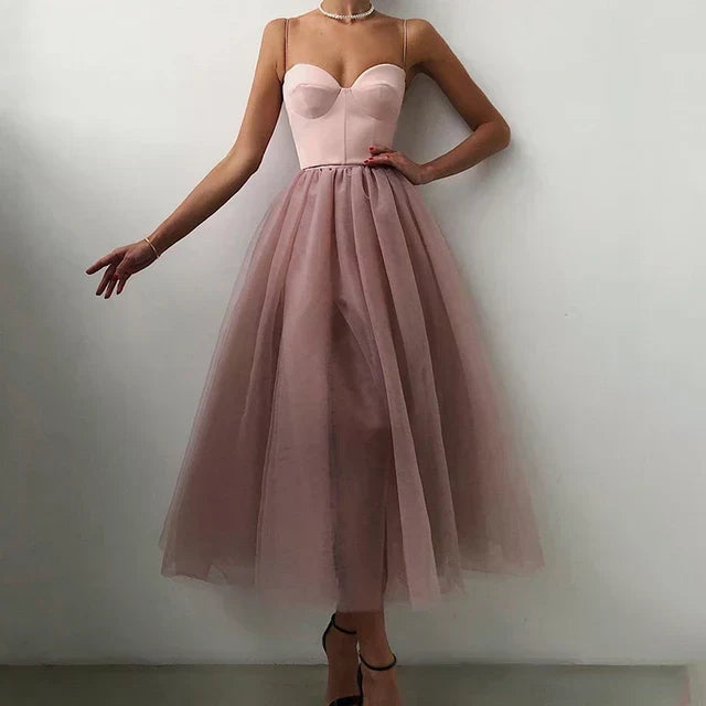 Elegant women's strapless evening gown for special occasions & formal events. Perfect black tie party dress.