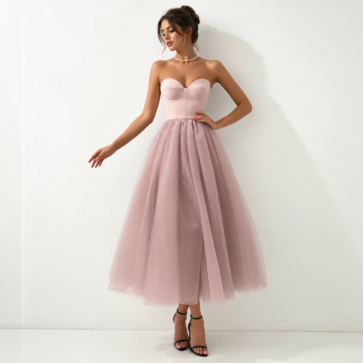 Strapless pleated maxi evening dress for women. A sophisticated formal gown for special occasions & proms.
