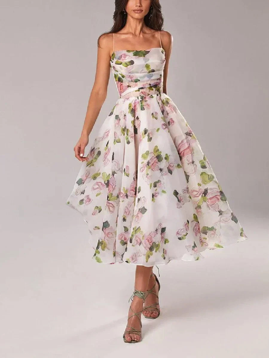 Stylish purple strapless cocktail dress with vibrant floral print for women. Ideal evening gown & party wear.