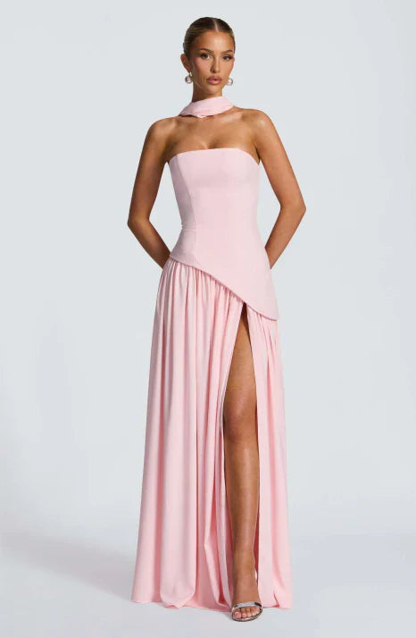 Stunning red strapless maxi evening gown, a flowing formal dress for elegant party occasions.