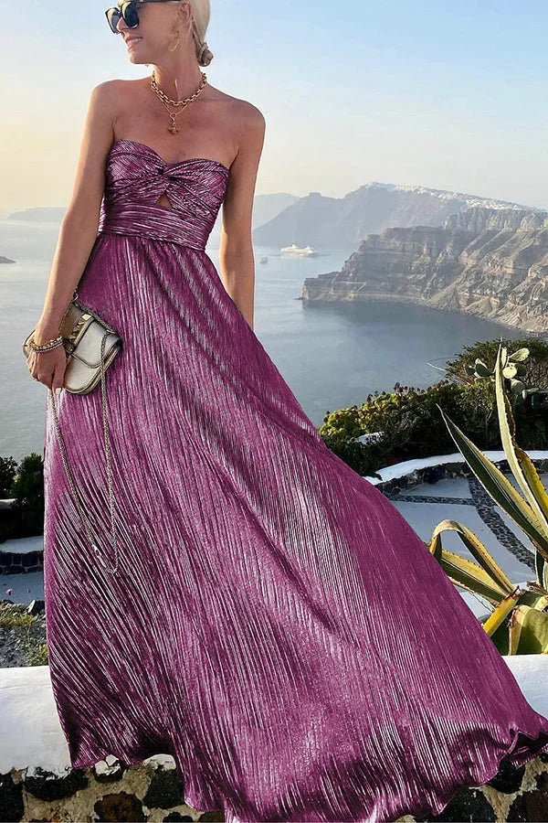 Formal strapless women's maxi dress, featuring a pleated design for a sophisticated evening look.