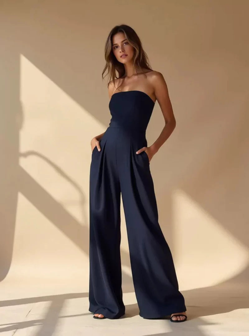 Black strapless wide-leg jumpsuit for women. Ideal elegant evening wear & party outfit. Comfortable & chic.