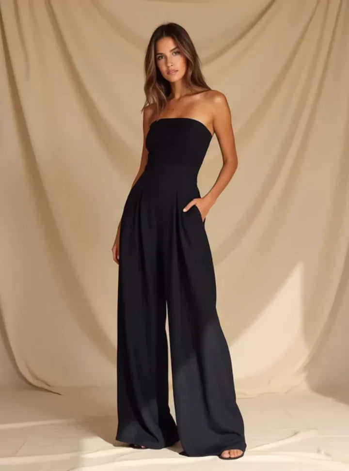 Stylish women's wide-leg strapless jumpsuit. Flowy design for elegant and comfortable party or summer fashion.