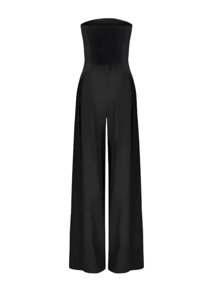 Navy blue elegant strapless wide-leg jumpsuit for women. Perfect for evening events, parties, or chic occasions.