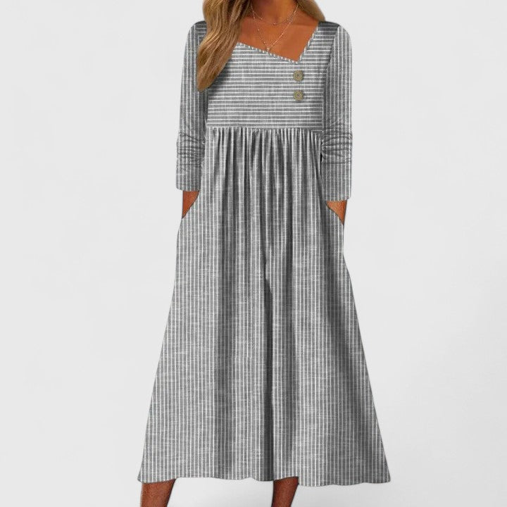 Elegant women's striped midi dress with button front, long sleeves, pockets & gathered waist for fall/spring fashion.