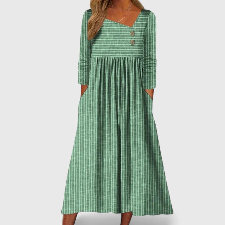 Versatile women's long-sleeve striped midi dress, button detail, pockets, ideal for elegant everyday fall/spring wear.