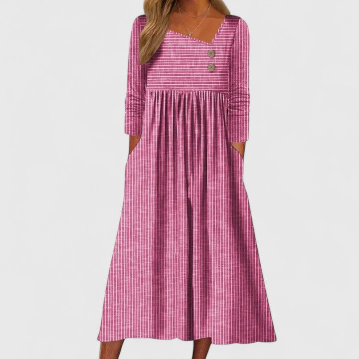 Chic women's striped midi dress featuring a button-down front, long sleeves, functional pockets & gathered waist.