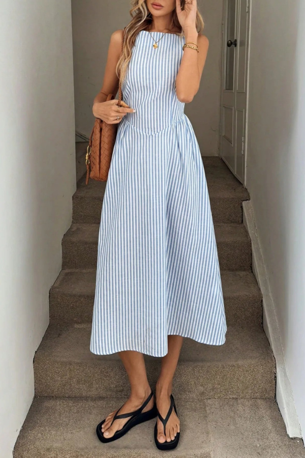 Elegant women's striped pleated halter neck midi dress, perfect for summer casual or party wear.