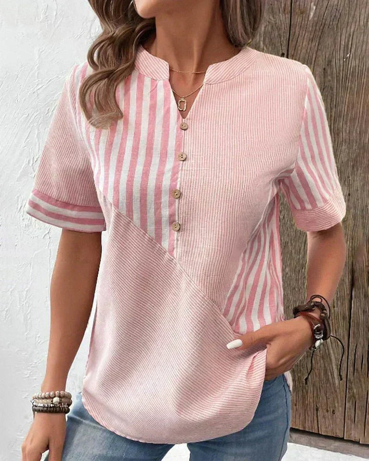 Elegant women's striped short sleeve blouse. Perfect for spring/summer office, workwear, or chic casual style.