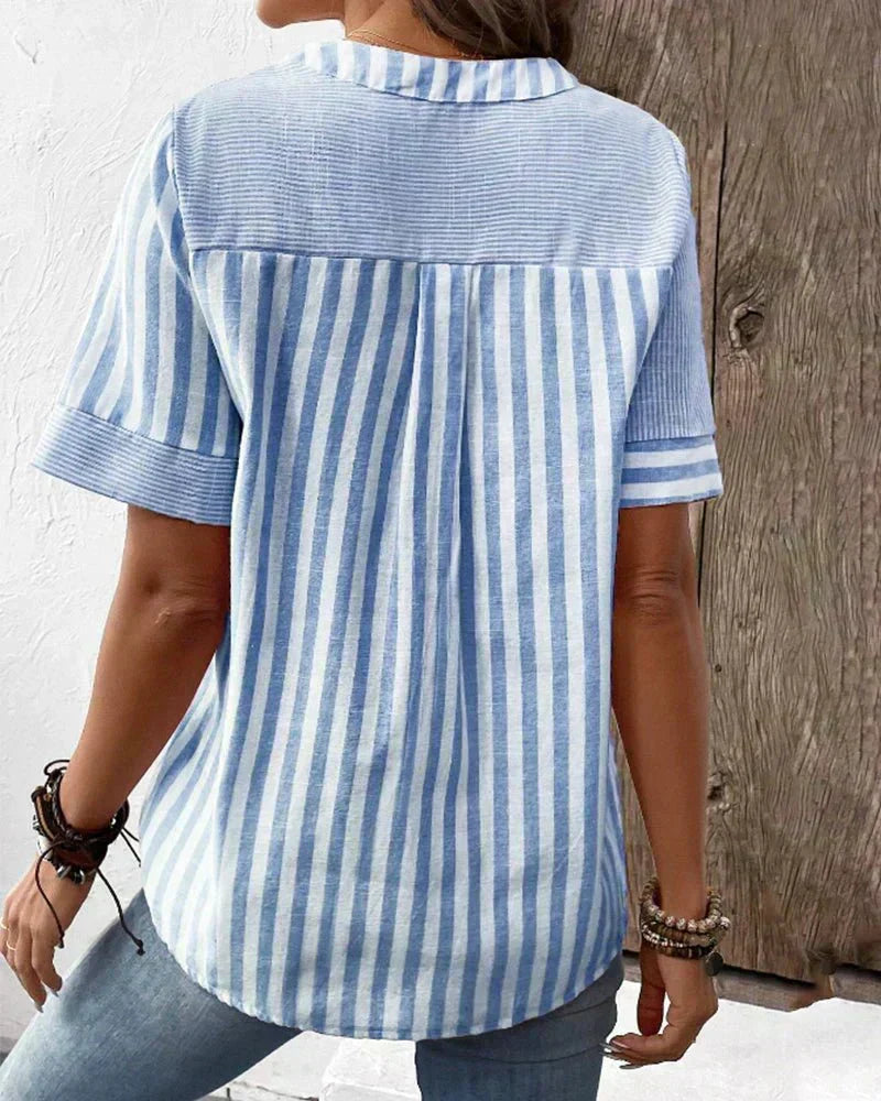 Versatile women's striped short sleeve blouse. Great for casual outings, elegant workwear, or spring/summer office.