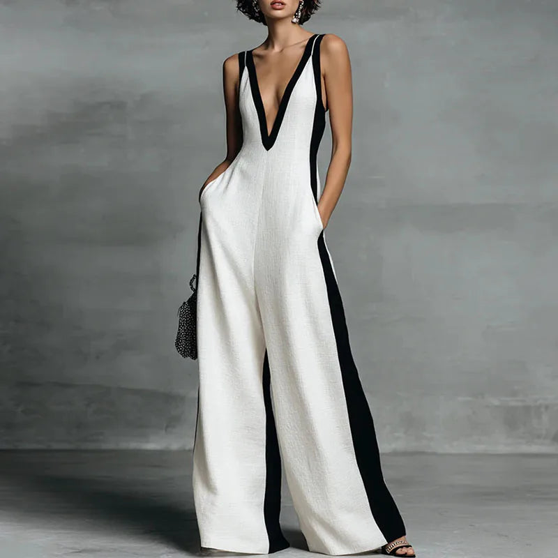 Elegant women's striped wide-leg jumpsuit with deep V-neck and sleeveless design, perfect for summer.