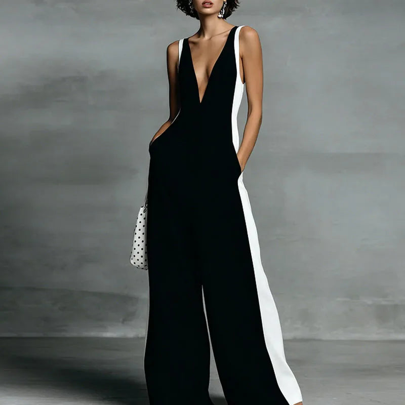 Fashionable women's deep V-neck wide-leg jumpsuit, sleeveless and striped, great for summer fashion & vacation.