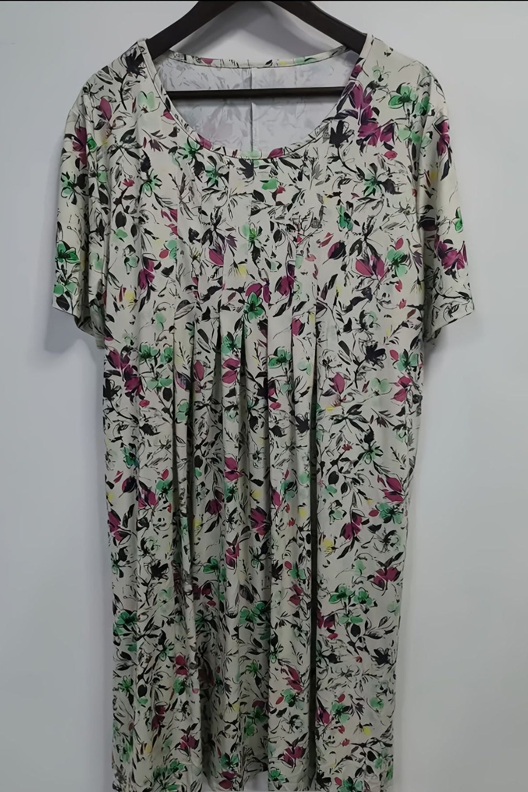 Versatile women's elegant midi dress, structured for a sophisticated look, suitable for work or formal gatherings.