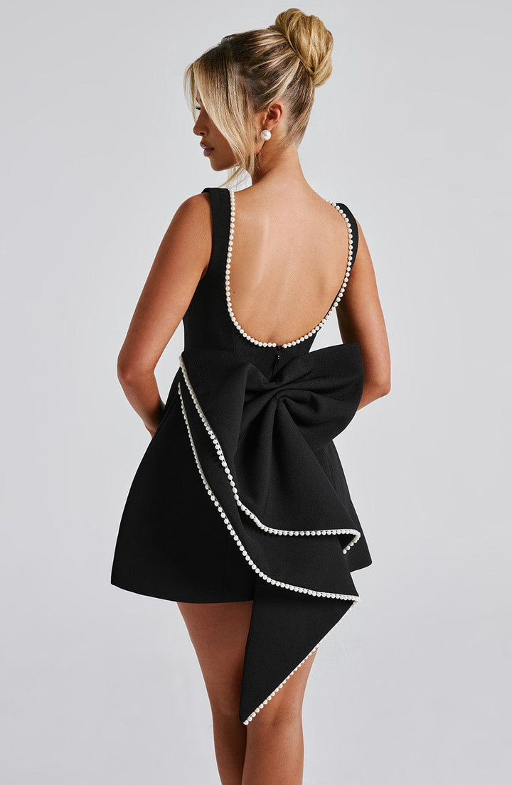 Stylish women's elegant mini dress, tailored & structured for a flattering fit. Great for parties and evening events.