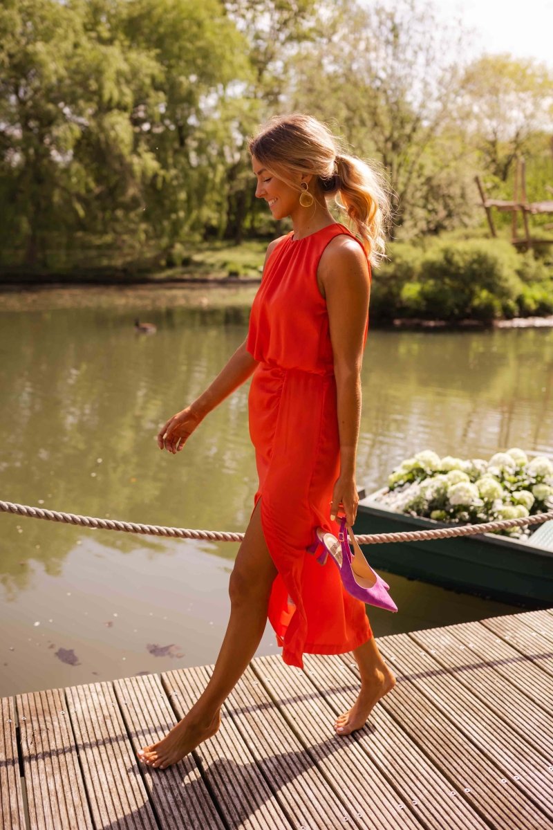 Comfortable flowing summer midi dress with adjustable straps. Great for elegant day wear.