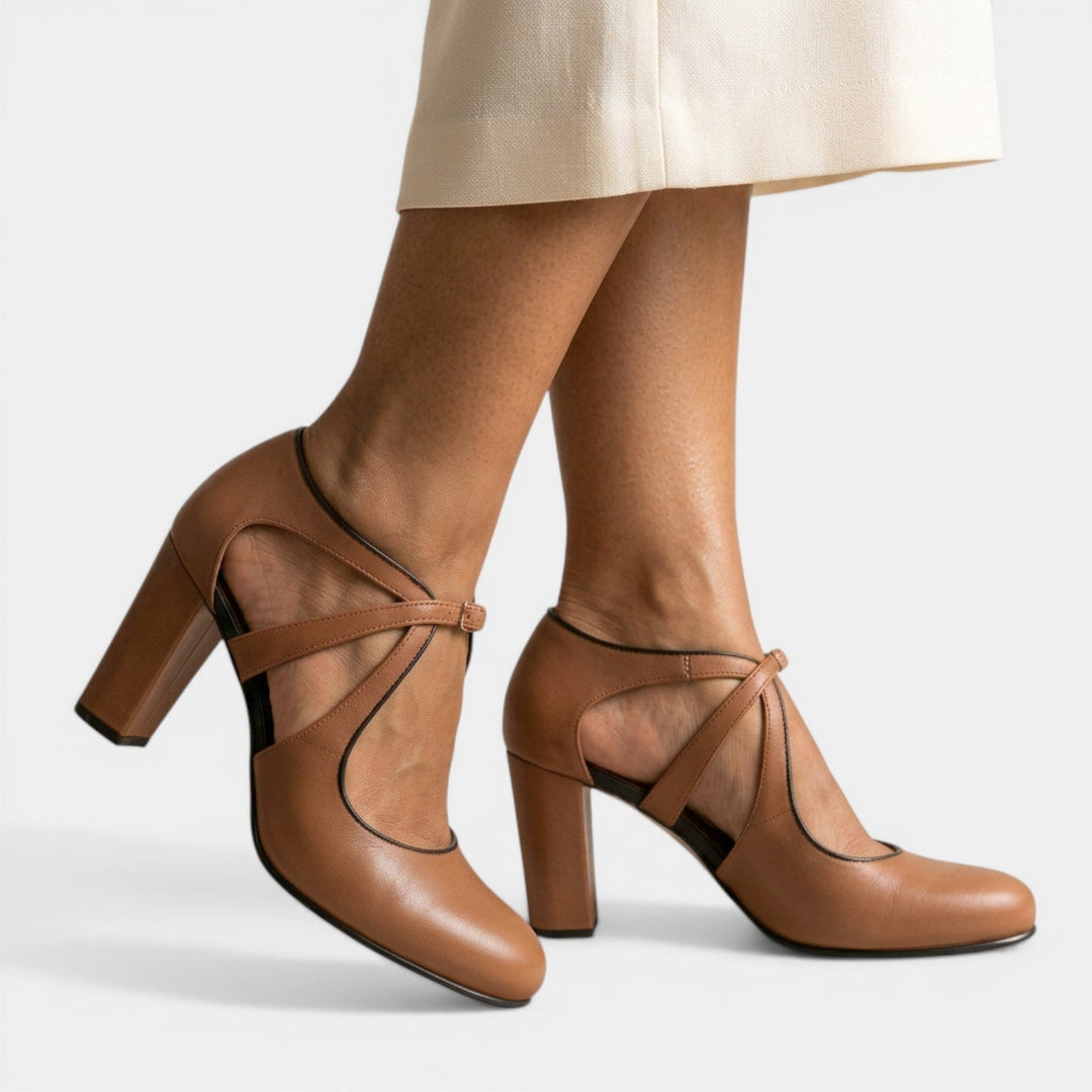 Elegant women's T-strap high heel sandals, perfect for formal eveningwear.