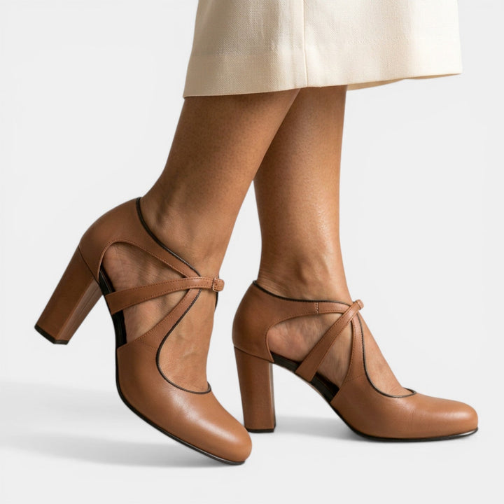 Elegant women's T-strap high heel sandals, perfect for formal eveningwear.