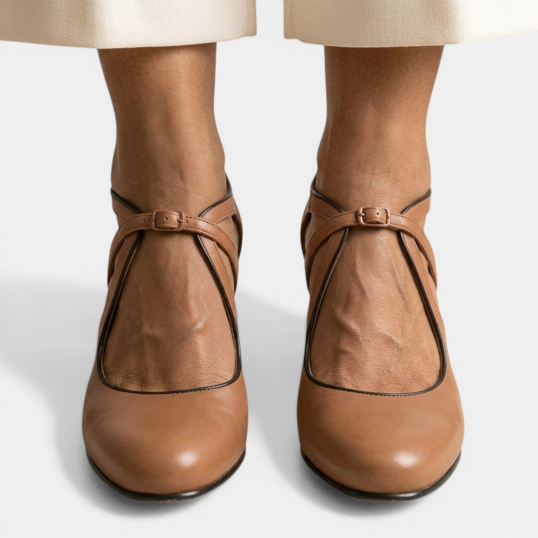 Chic women's T-strap high heels, ideal footwear for formal events & eveningwear.