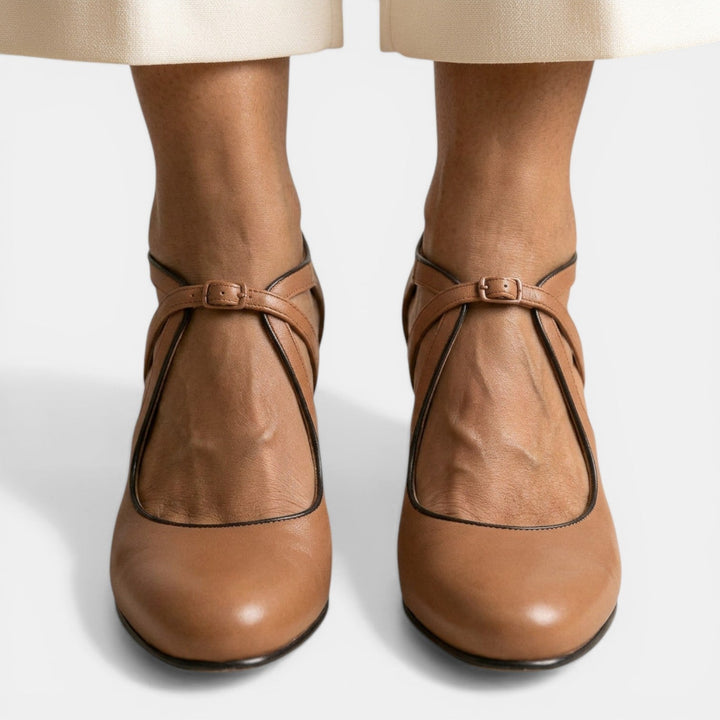 Chic women's T-strap high heels, ideal footwear for formal events & eveningwear.