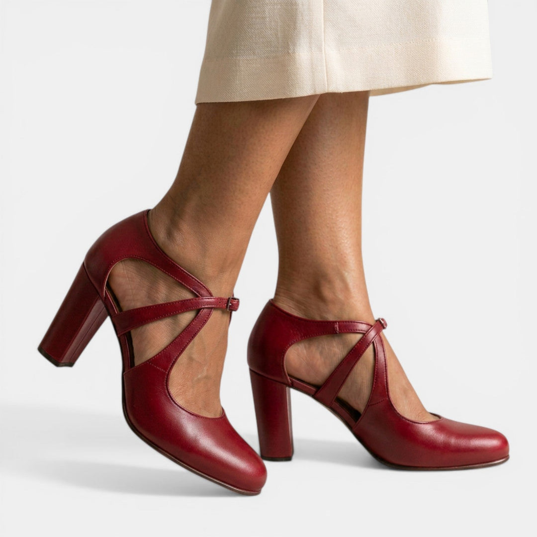 Formal women's T-strap high heel sandals with a sleek design, suitable for any elegant occasion.