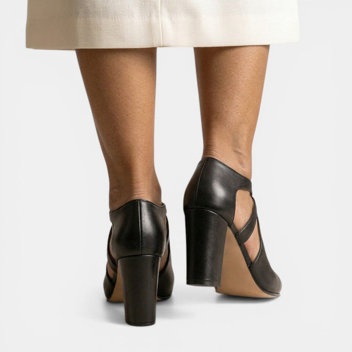 Stylish women's T-strap high heel sandals, a versatile and elegant choice for formal eveningwear.