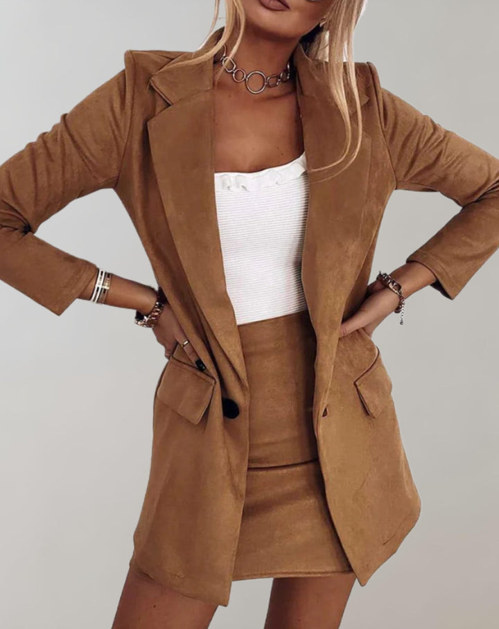 Stylish women's tailored blazer and mini skirt set for a sophisticated business casual or fashion-forward look.
