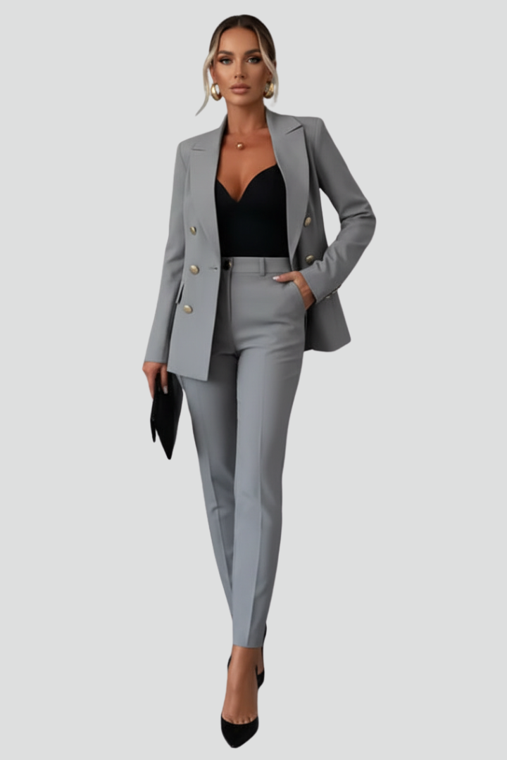 Elegant tailored blazer details from a women's two-piece suit, ideal for professional attire.