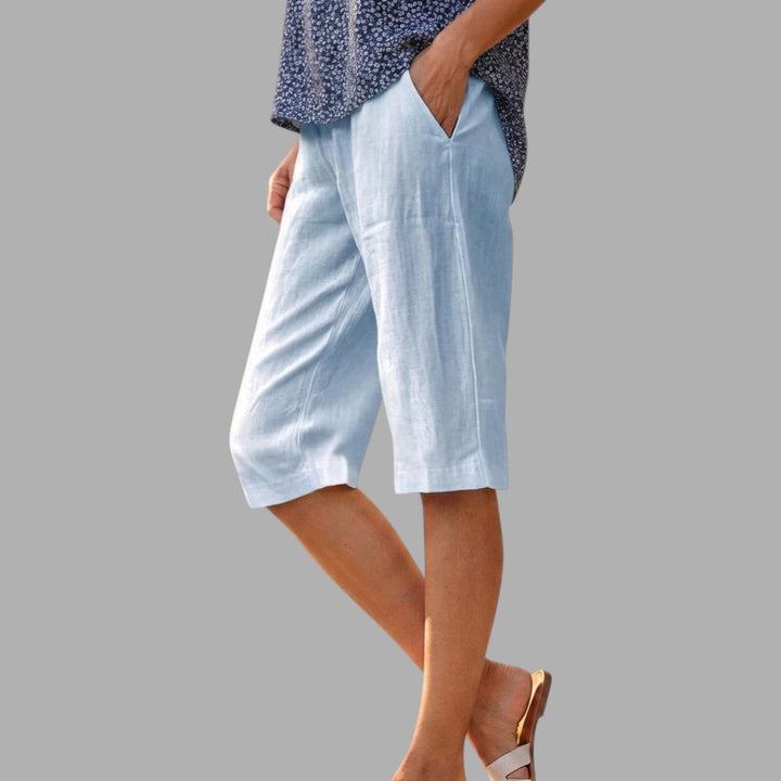 Classic women's knee-length tailored shorts, ideal for elegant smart casual summer fashion and apparel.