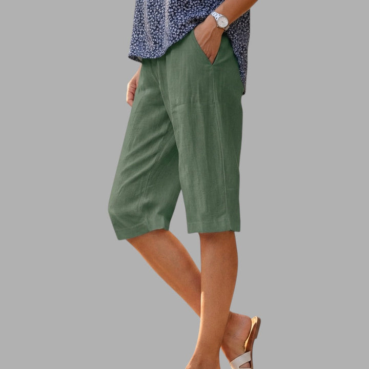 Women's Elegant Tailored Knee-Length Shorts, a smart casual and versatile choice for summer apparel.