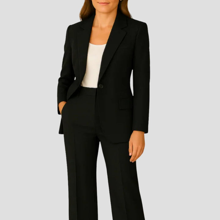 Women's elegant trouser suit: a sleek tailored blazer & flowing wide-leg pants. Versatile professional and office wear.