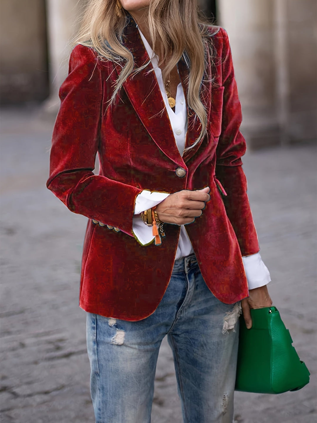 Elegant women's tailored velvet blazer with chic gold buttons, perfect for formal or office wear.