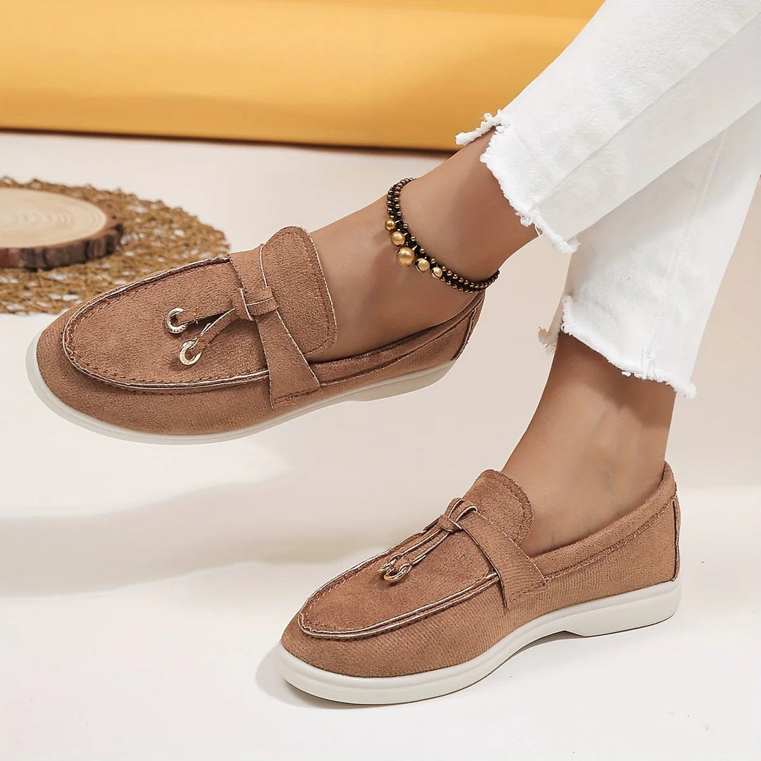 Elegant women's tassel loafers, perfect for office or casual chic sophisticated style. Comfortable slip-on shoes.