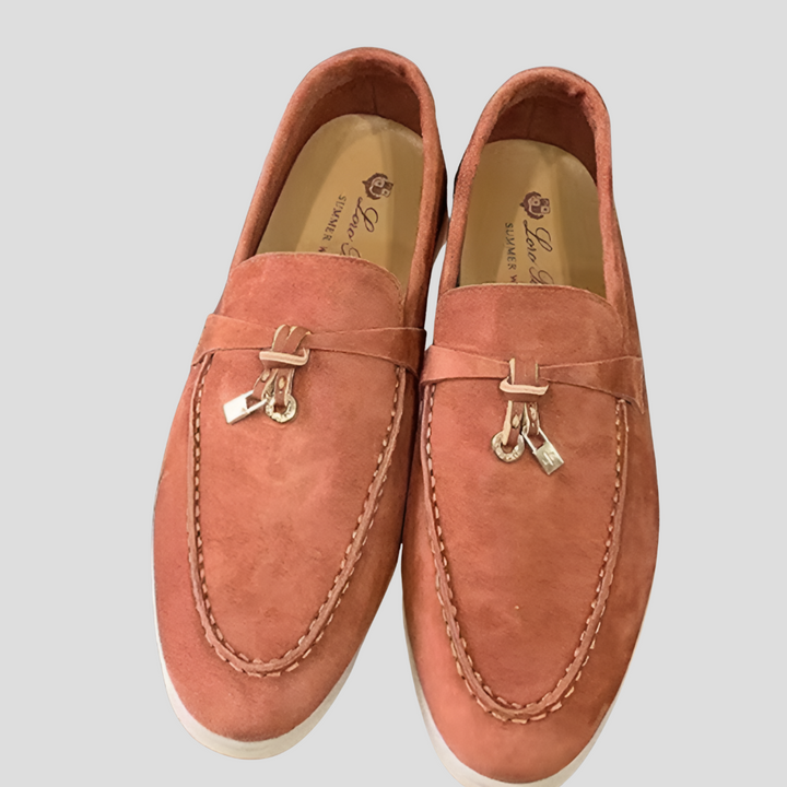 Women's formal tassel loafers featuring elegant detailing, offering a classic and comfortable look for any occasion.