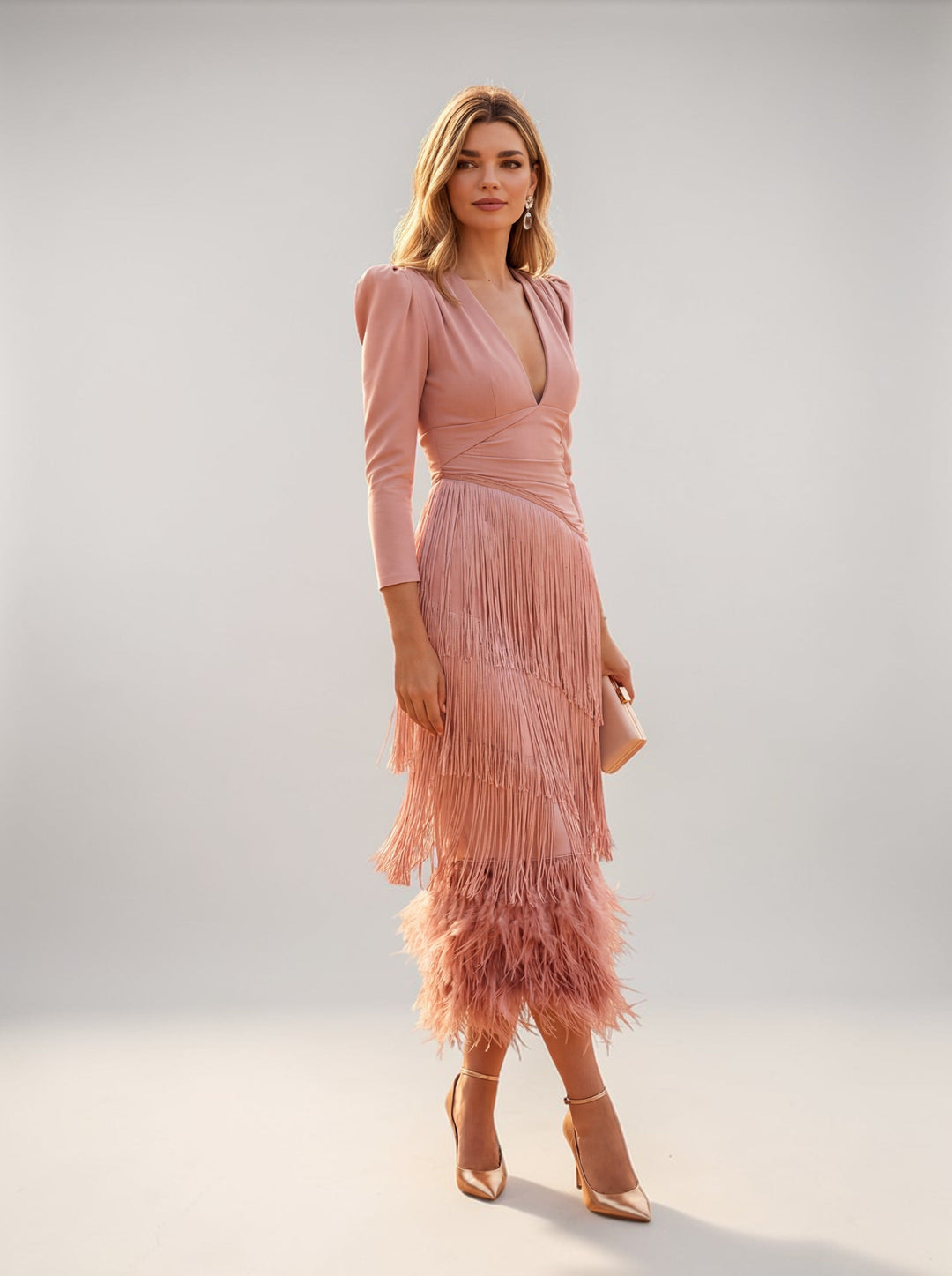 Elegant women's party midi dress featuring tiered fringe, V-neck, and long sleeves, ideal for evening events.