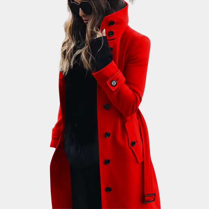 Sophisticated women's long trench coat with belt & double-breasted design, ideal for fall and winter fashion.