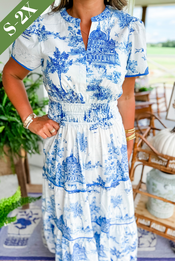 Stylish long women's dress: toile print maxi, smocked waist, tiered design. Perfect for elegant casual wear.