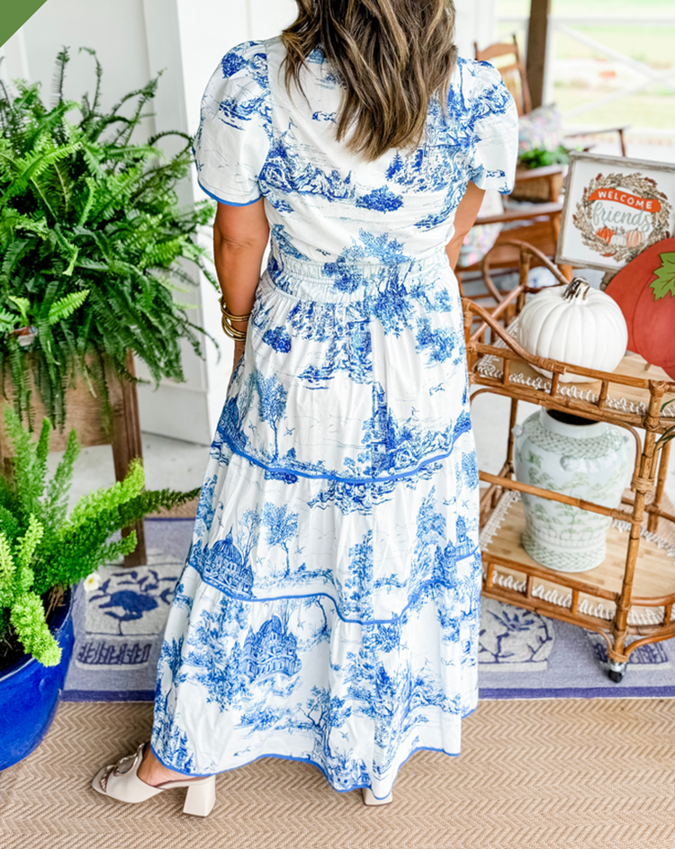 Beautiful women's toile print V-neck maxi dress with a smocked waist and tiered skirt. Great for spring fashion.