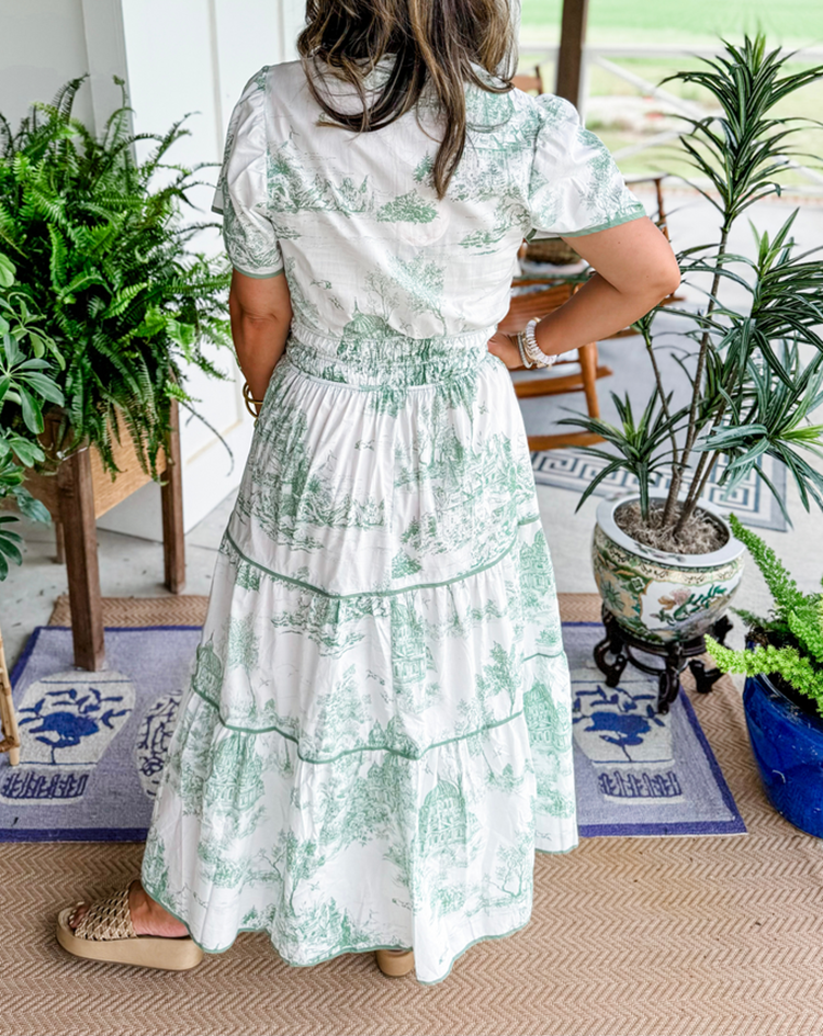 Comfortable women's toile print maxi dress with smocked waist & tiered skirt. Elegant V-neck for spring and summer.
