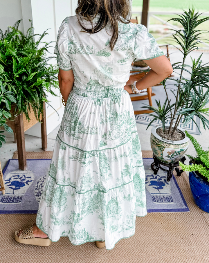 Comfortable women's toile print maxi dress with smocked waist & tiered skirt. Elegant V-neck for spring and summer.