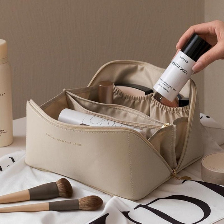 Elegant women's travel makeup organizer bag for cosmetics & beauty essentials. Portable storage solution.