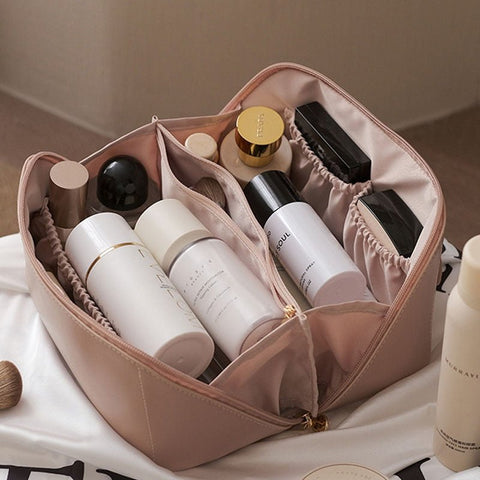 Brown elegant travel makeup organizer bag for women's cosmetics & beauty essentials. Portable storage.