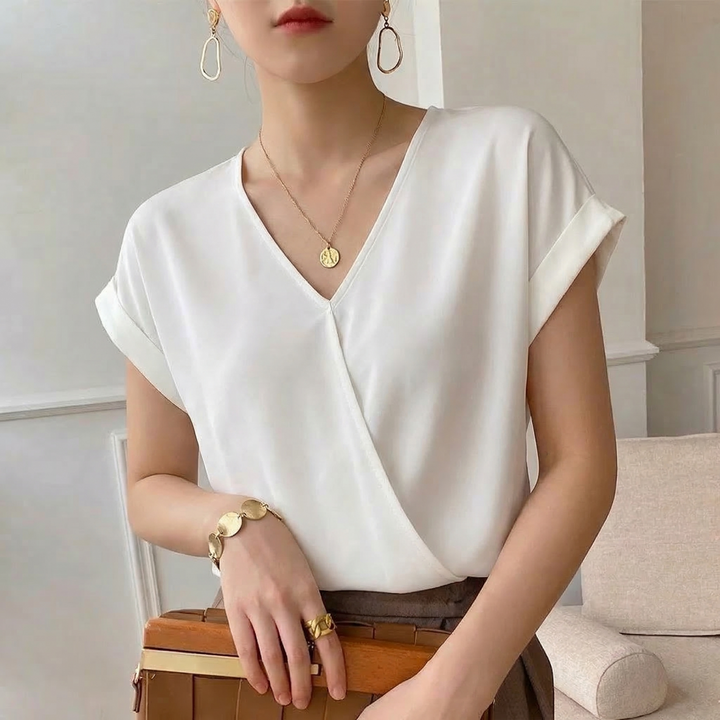 Stylish women's V-neck top with an elegant twist front design. Perfect short sleeve tee for chic summer fashion.