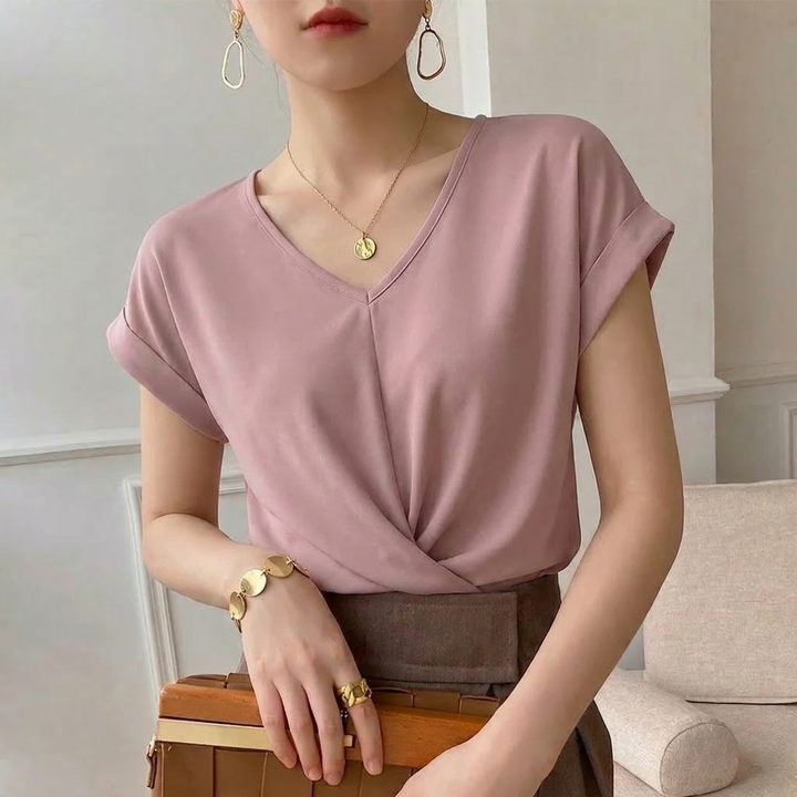 Modern women's elegant twist front V-neck t-shirt. Comfortable short sleeve top for spring and summer style.