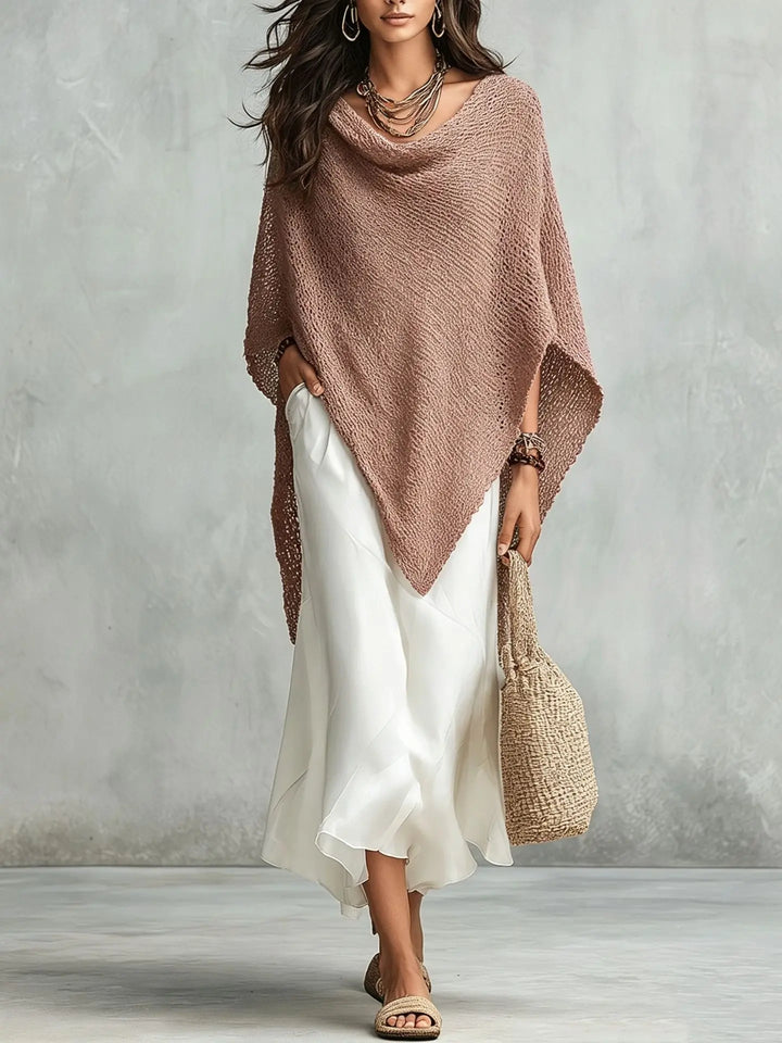 Sophisticated women's elegant poncho & maxi dress combo. A versatile, relaxed-fit two-piece for modern fashion.