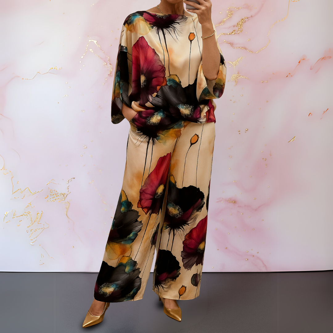 Stylish women's satin two-piece set, featuring an elegant top and matching pants, perfect for formal or casual events.